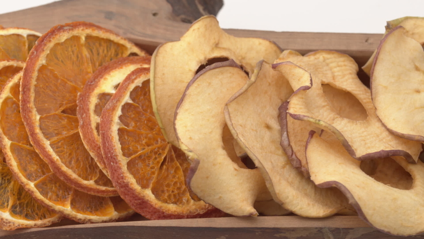 Dried fruits rotating. Close up. Dried orange, ananas, kiwi, apple, grapefruit.
 Royalty-Free Stock Footage #1075551044