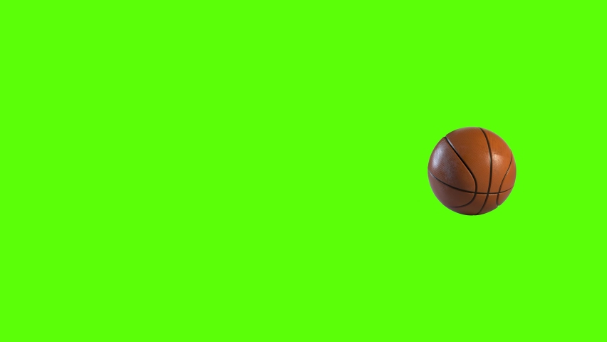 Side on view of a 3D basketball rolling across the screen. Standard basketball in a continuous spin perfect for sports advertising. 4K clip at 60fps with a green screen.