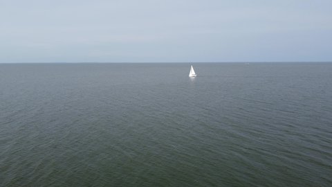 Sailboat on the Ijsselmeer sea in the Netherlands near Enkhuizen.