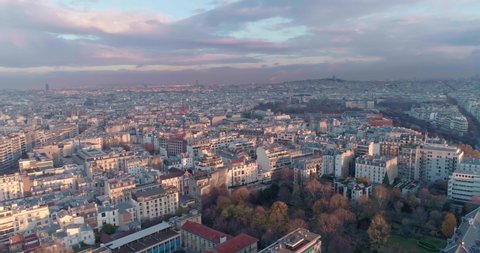 Aerial view of Paris waking up to a winter morning and a beautful colorfull sky
