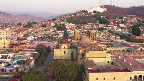Historic Downtown on Oaxaca City, Mexico. Drone Aerial View of Catholic Church and Old Colonial Buildings on Sunset Sunlight