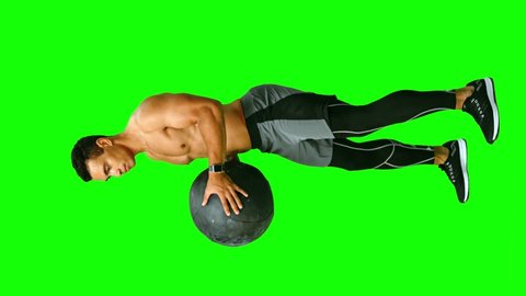 Sporty man doing ab exercises with a heavy medicine ball. Full length. Alpha channel. See other exercises. Vertical footage