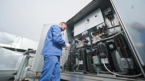 The technician repair electronic temperature sensors with an electronic soldering iron - Powered by Shutterstock - Get 15% off with code: PIKWIZARD15