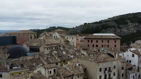 View Over Tiled Roofs Of Science Museum And Convent Of La Merced In Cuenca, Castile La Mancha, Spain. aerial