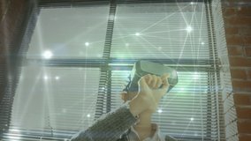Animation of network of connections over woman wearing vr headset. global connections, data processing, digital interface and technology concept digitally generated video. - Powered by Shutterstock - Get 15% off with code: PIKWIZARD15