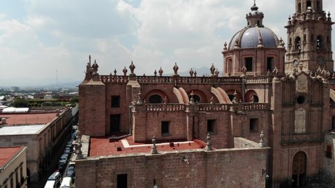 Aerial view of the Cathedral of Morelia. Shooting with drones. Mexico Cathedral of Morelia Michoacán. I
Urban city drone view 4k sunny day sky blue church lateral viel
