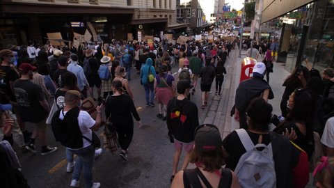 BRISBANE, QUEENSLAND, AUSTRALIA. JUNE 06 2020. Looking down on Black Lives Matter demonstration through the streets of Brisbane.