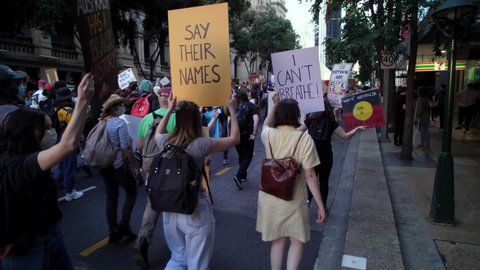 BRISBANE, QUEENSLAND, AUSTRALIA. JUNE 06 2020. 'No Justice - No Peace'   'Say Their Names'  'I Can't Breathe' placards at demonstration.