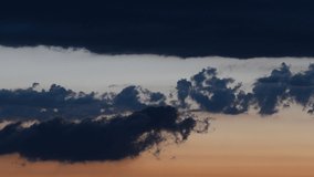 timelapse of dramatic cloudy sky at sunset