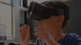 Animation of over equations over schoolboy wearing vr headset. education, data processing, connection, technology and digital interface concept digitally generated video.