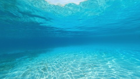 Underwater video, stunning view of a turquoise water forming a natural pattern. Caprera, La Maddalena Archipelago, Sardinia, Italy.
