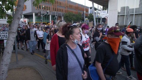BRISBANE, QUEENSLAND, AUSTRALIA. JUNE 06 2020. Thousands attend a Black Lives Matter demonstration in Australia, slow motion.