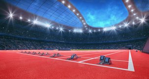 Athletic sport stadium full of fans and racing track with starting blocks. 
Professional sport 4k video for advertisement background.