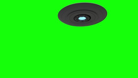 Alien UFO spaceship on green screen background multiple flight patterns.