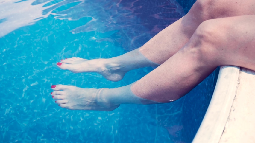Legs underwater swimming pool Stock Video Footage - 4K and HD 