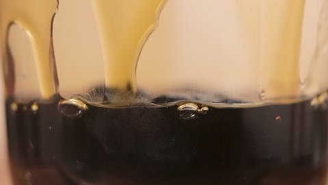 Macro Shot, Blending Pearl Milk Tea Process, with Tapioca Balls at the Bottom