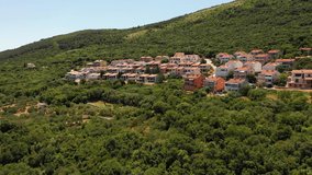 Small holiday appartments, city or a town in the summer full of tourists, beautiful location in the forest, close to the sea