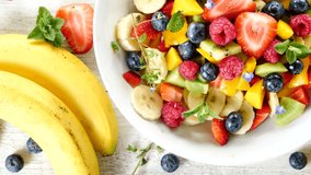 fresh fruit salad- top view - Powered by Shutterstock - Get 15% off with code: PIKWIZARD15