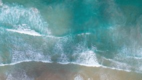 TOP VIEW SUMMER BEACH AND SEA AERIAL VIEW OF DRONE.