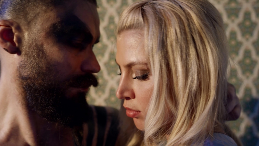 temptation and alluring of virgin by demon, pretty blonde woman is exciting and stroking man