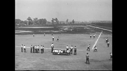 CIRCA 1931 - Teen boys play baseball and football at boarding school.