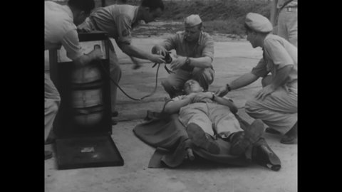 CIRCA 1944 - A US Army Air Force pilot suffering from severe shock is taken out of his plane and an ambulance drives up to treat him.