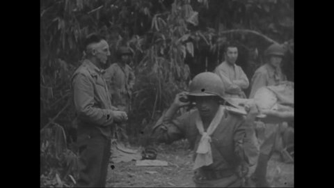 CIRCA 1945 - General Stilwell observes the work of Dr. Gordon Seagrave as he tends to wounded Chinese soldiers in Burma.