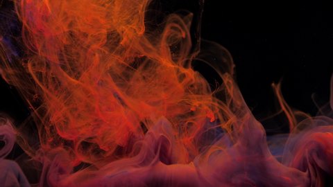 Red orange and purple ink acrylic paint mixing in water, swirling softly underwater. Colored acrylic cloud paint in aquarium. Slow motion abstract smoke explosion animation. Beautiful art background