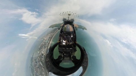 CIRCA 2021 Fisheye lens cockpit aerial footage of an A-10 Thunderbolt II Demonstration Team jet flying over Cocoa Beach, FL.