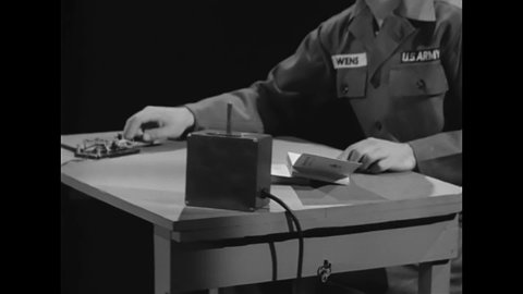 CIRCA 1946 - A soldier uses Morse code to transmit jazz lyrics.