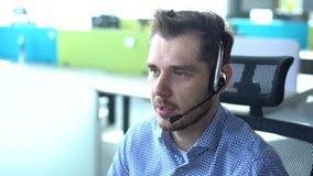 Male representative call center agent in wireless headset helping client, operator working in customer support service - Powered by Shutterstock - Get 15% off with code: PIKWIZARD15