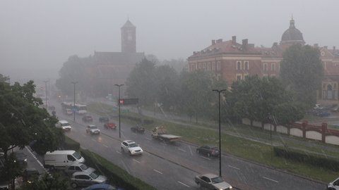 Cracow, Poland, 10.07.2021: The summer storm with hail is over the city.