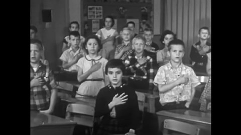CIRCA 1950s - School children recite the Pledge of Allegiance in 1955.