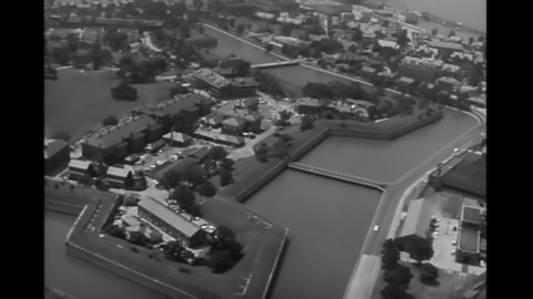 CIRCA 1960s Fort Monroe, Virginia - Sergeant Stuart Queen views the fort from a helicopter and speaks about its moat.