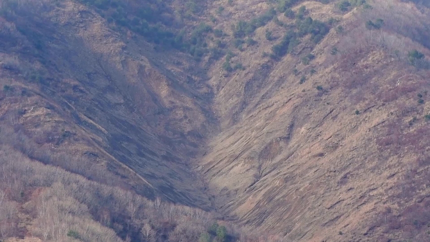 CIRCA 2020 Detonation of aerial bombs aimed at targets at the Pilsung Range, South Korea.