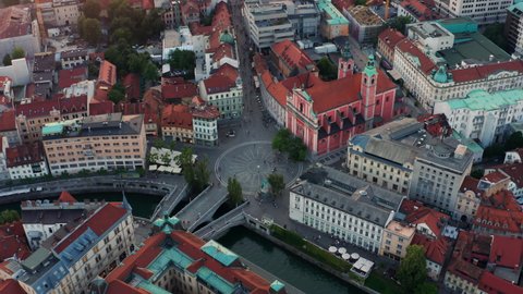 Top View Of Triple Bridge And Franciscan Church In Preseren Square In Ljubljana City Center In Slovenia. aerial