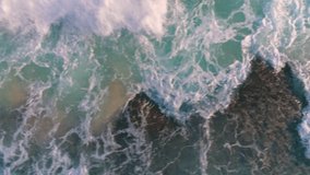 Drone video top view ocean waves texture turquoise color