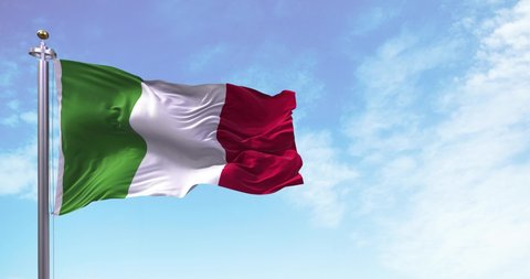 The national flag of Italy flying in the wind. Outdoors and sky in the background. Democracy and independence. European state
