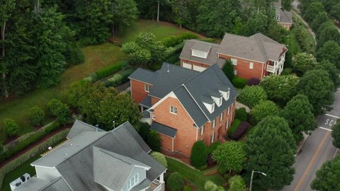 Upscale Southern brick 3-story home surrounded by private wooded forest. Exclusive upscale residence in USA.