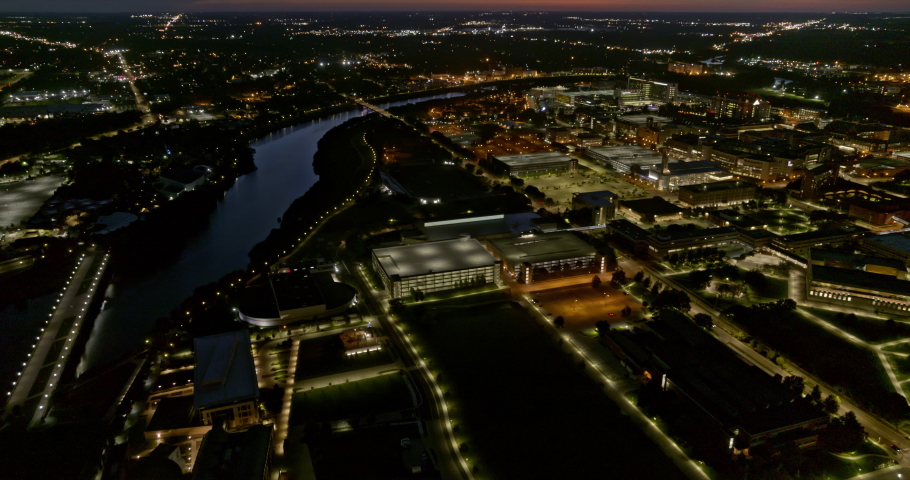 Indianapolis Indiana smooth tilt up aerial reveal and university areas of the city at night - 6k cinematic footage - August 2020