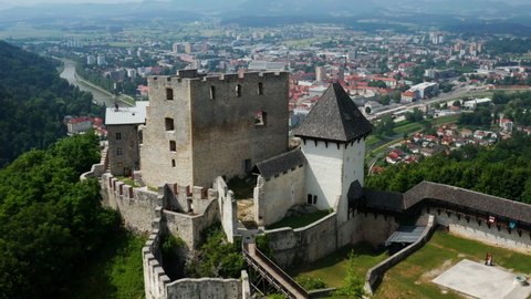 Castle Complex Ruins With A View Of The Cityscape Of Celje In Slovenia. aerial, orbit