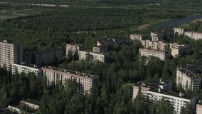 Aerial video abandoned buildings In Ghost Town Pripyat, Ukraine. Chernobyl Disaster Exclusion Zone. Summer