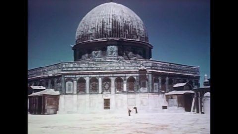 CIRCA 1957 - Jerusalem's Dome of the Rock and other ancient architecture in the Middle East provides a stark contrast to the arid desert.