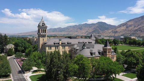 Circa - July, 8, 2021 - Logan Utah - Aerial view looking at the historic USU Old Main Building in Logan Utah.