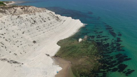 scala dei turchi aerial view drone flying backwards and ascending,stair of the turks,sicily italy