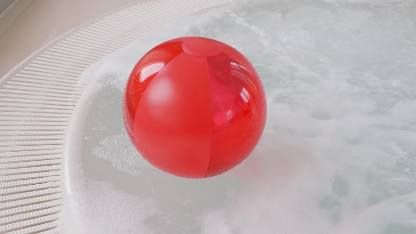 Red ball in the hot tube Royalty-Free Stock Footage #1075853654