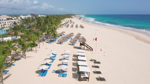 Aerial View Of Cottage And Lifeguard Tower At White Sand Beach Near Hard Rock Hotel In Punta Cana, Dominican Republic.