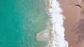 TOP VIEW BEACH AND SEA AERIAL VIEW OF DRONE.