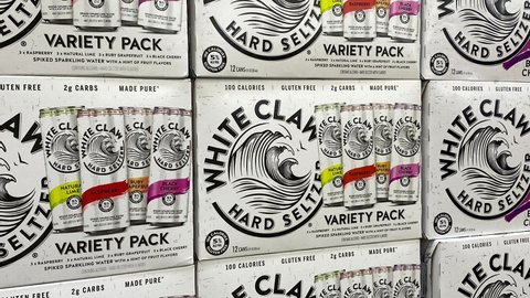 Orlando, FL - USA February 6, 2021: Zooming out on cases of White Claw Hard Seltzer at a Sams Club store.