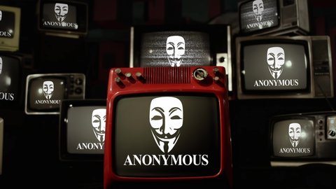 New York City, USA - July 2021: Guy Fawkes Masks on Retro Televisions, the Guy Fawkes Mask has become a Symbol for the Hacker Group Anonymous. 4K Resolution.